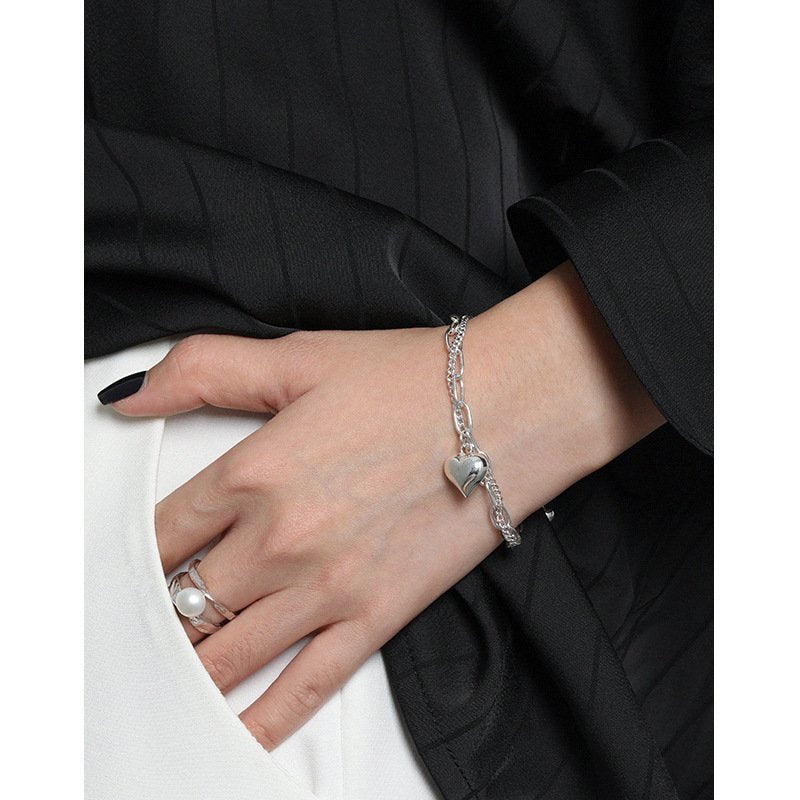 heart charm in a lovely dual-chain design in sterling silver 6