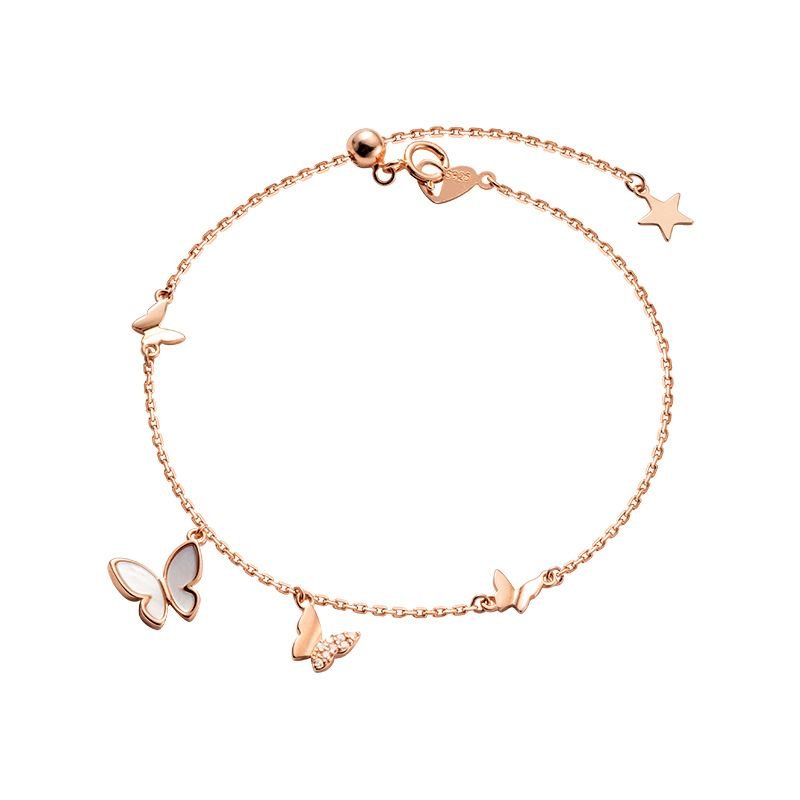 Butterflies charm bracelet in a rose gold finish with charming star pendants crafted in 925 sterling silver 1