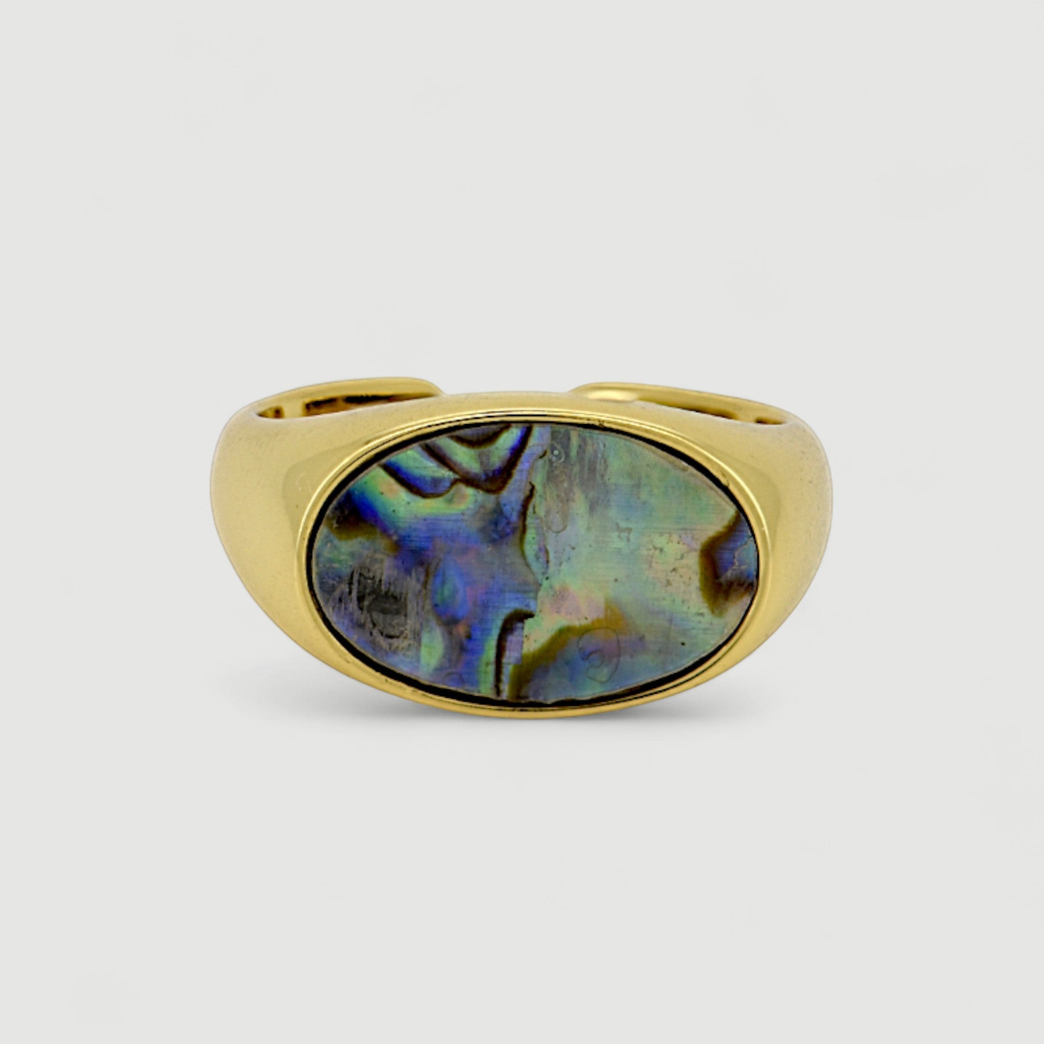 Amara Jewels gold-tone open ring with oval abalone shell inlay featuring iridescent blues, greens, and purples.