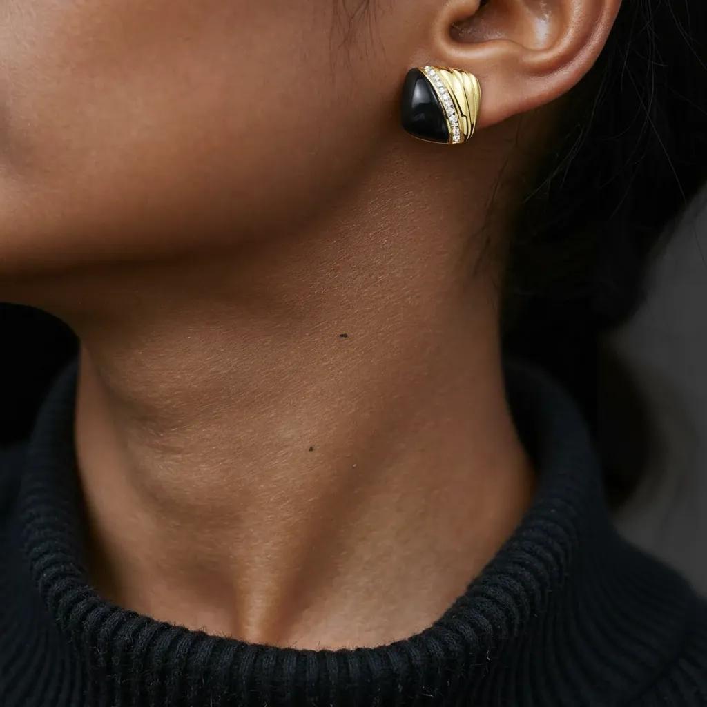 Amara Jewels gold-plated sterling silver stud earrings with black enamel and cubic zirconia accents.