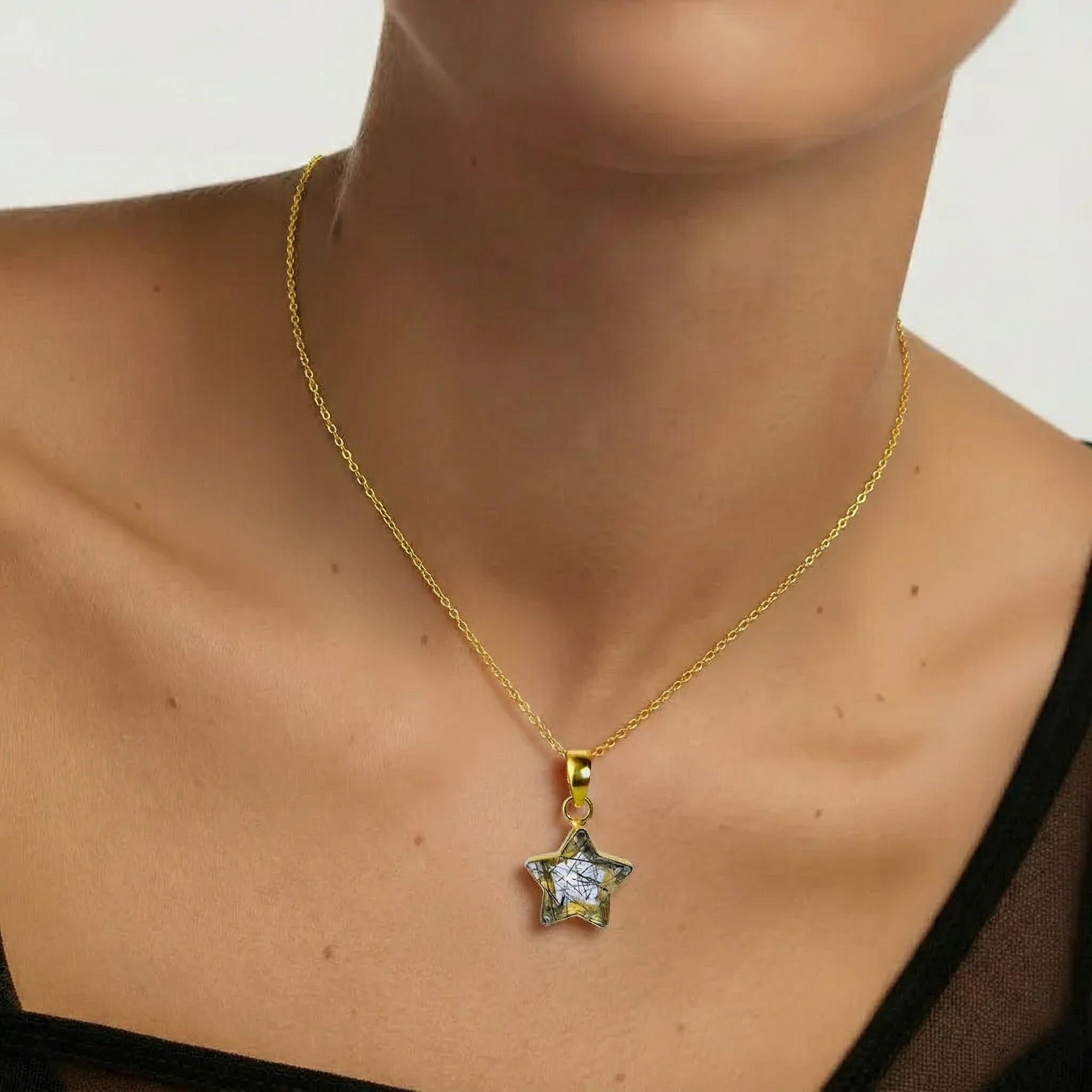 Amara Jewels star pendant necklace with black rutilated quartz and 18K gold vermeil chain.