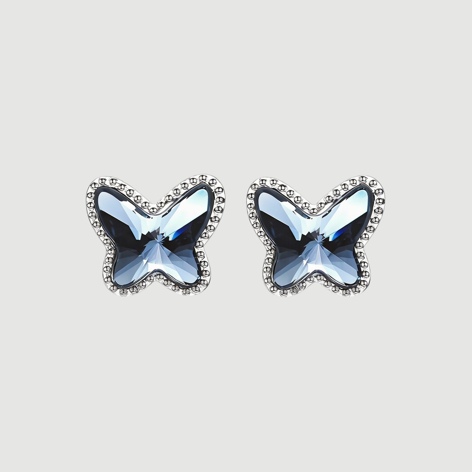 Amara Jewels blue crystal butterfly stud earrings with beaded sterling silver frame.
