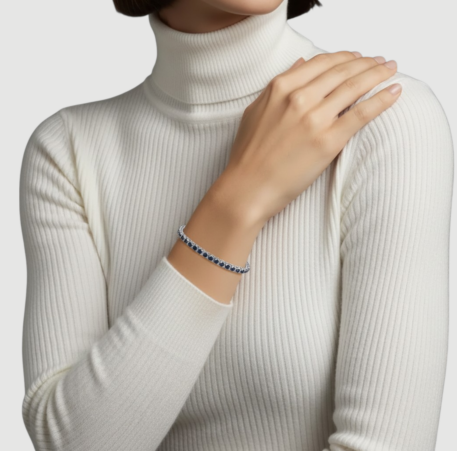 Amara Jewels sterling silver slider bracelet with deep blue sapphires and adjustable chain.
