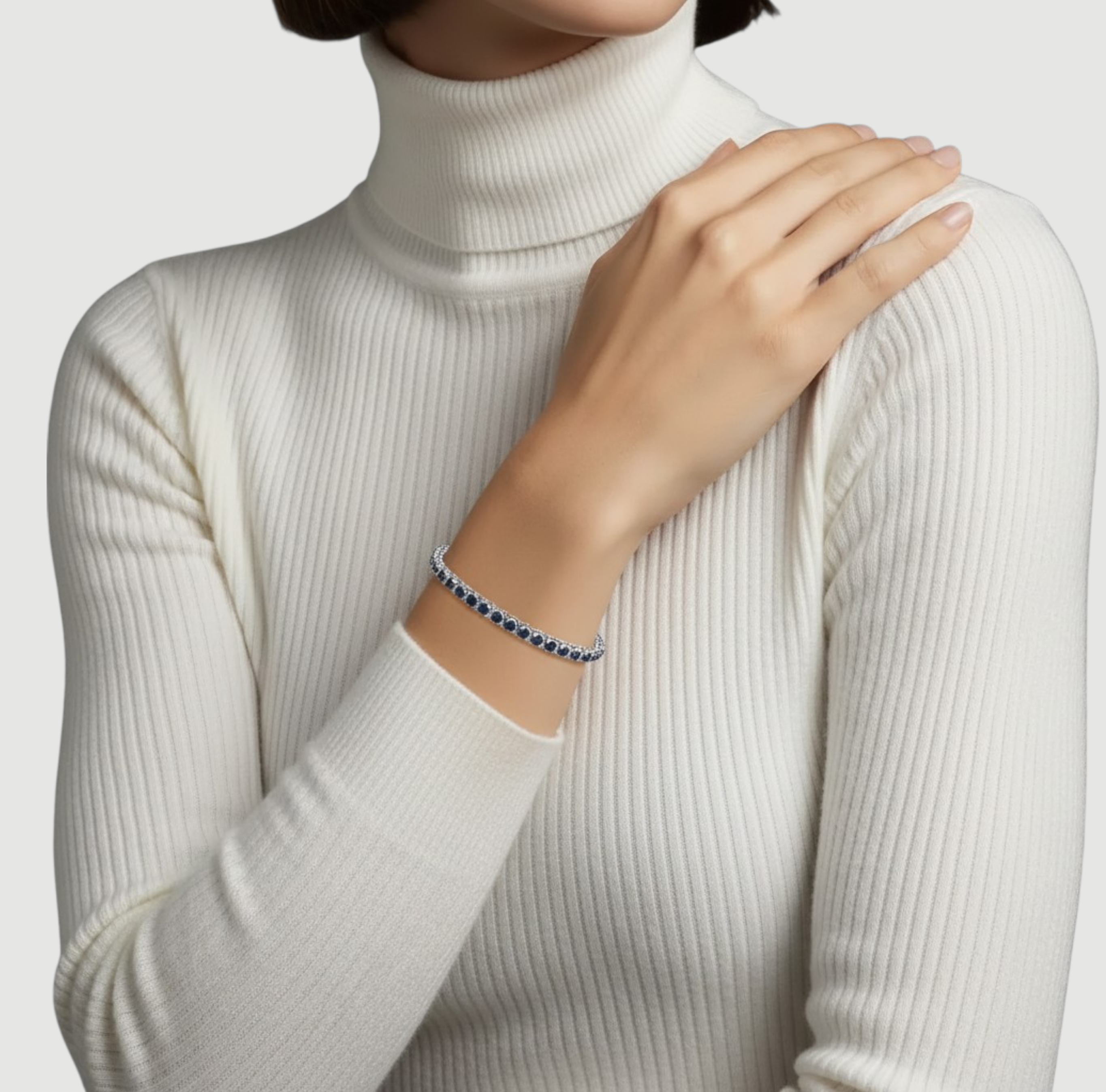 Amara Jewels sterling silver slider bracelet with deep blue sapphires and adjustable chain.