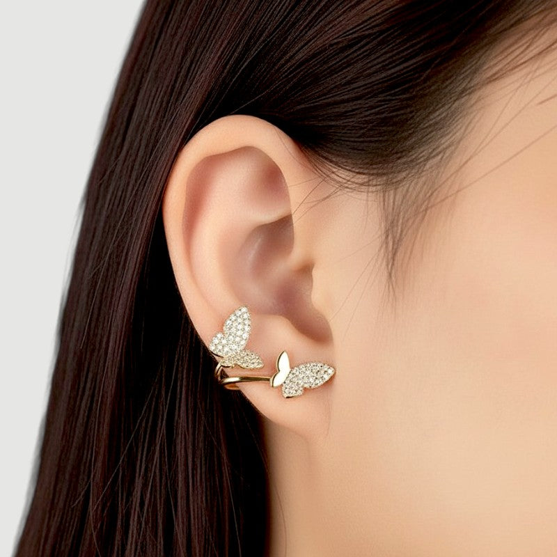 Amara Jewels gold-plated sterling silver climber earrings with cubic zirconia butterflies.