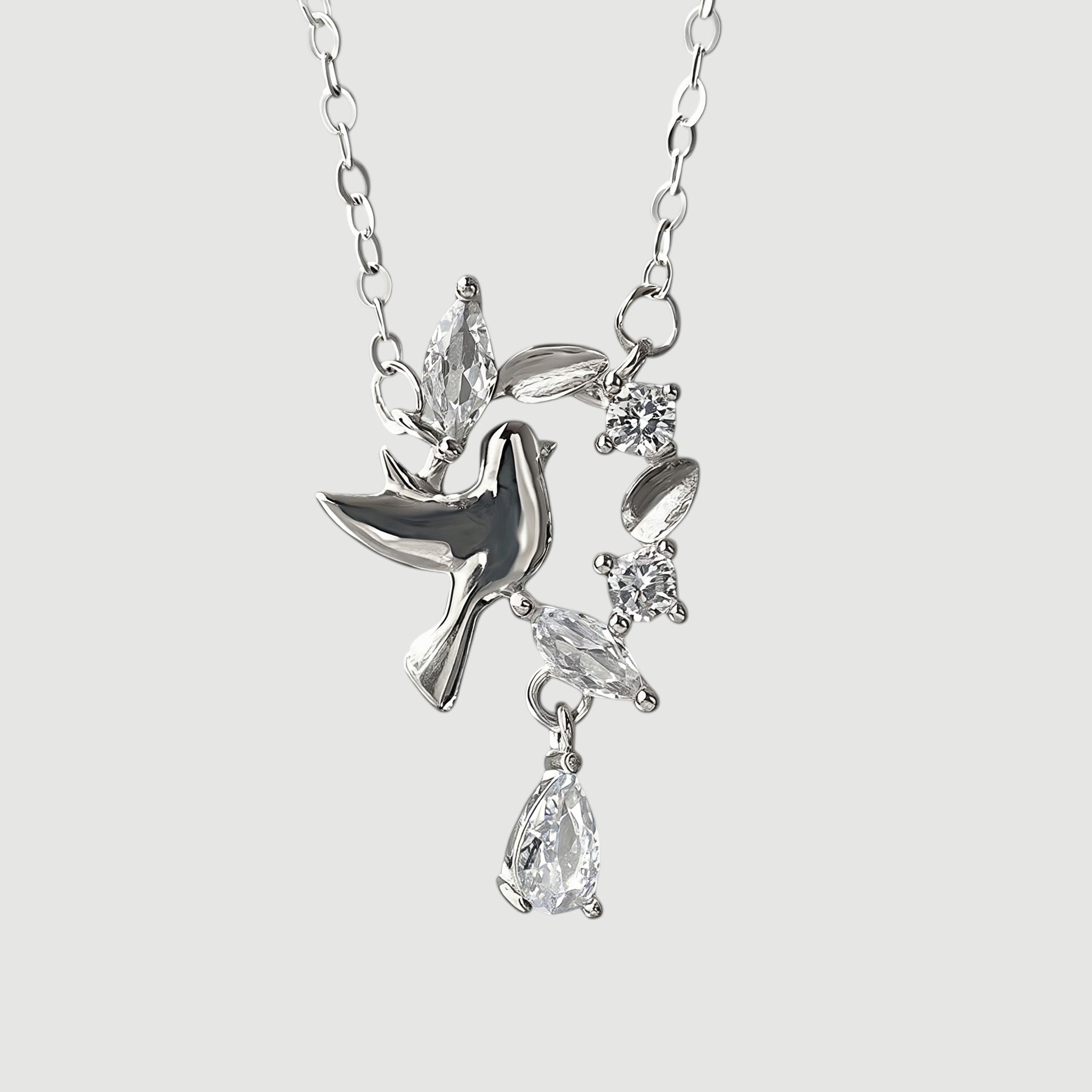 Amara Jewels 925 sterling silver dove pendant necklace with cubic zirconia accents, symbolizing peace and grace.