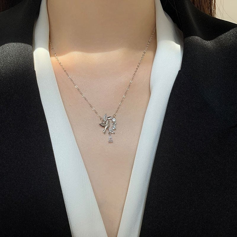 Amara Jewels 925 sterling silver dove pendant necklace with cubic zirconia accents, symbolizing peace and grace.