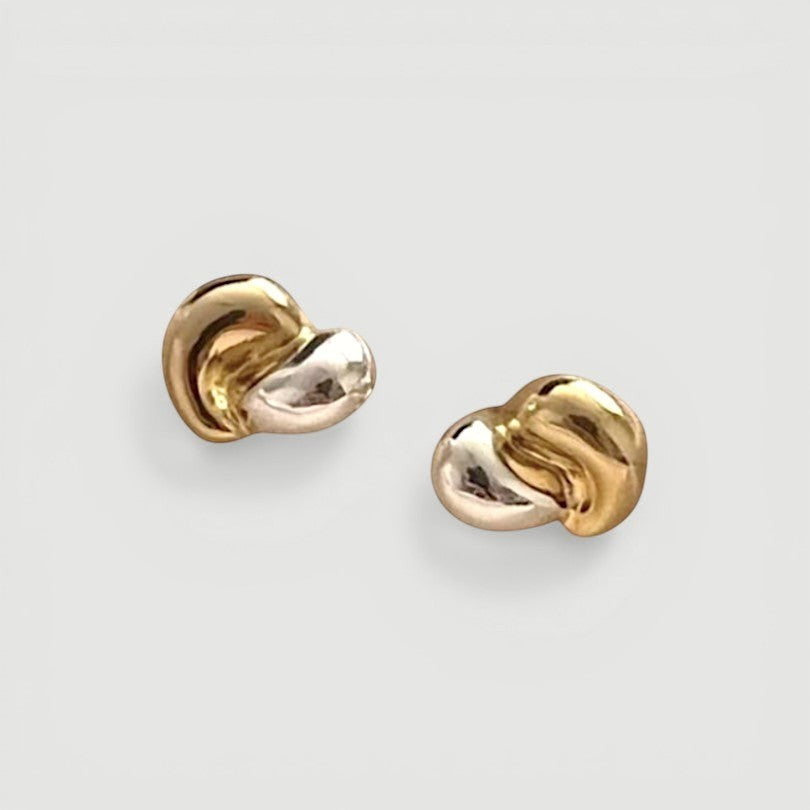 Amara Jewels dual-tone stud earrings in 18K gold-plated sterling silver with organic, fluid shape.