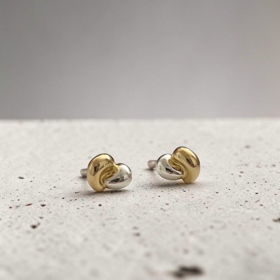 Amara Jewels dual-tone stud earrings in 18K gold-plated sterling silver with organic, fluid shape.