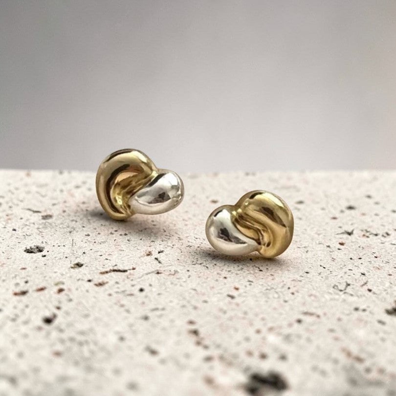Amara Jewels dual-tone stud earrings in 18K gold-plated sterling silver with organic, fluid shape.