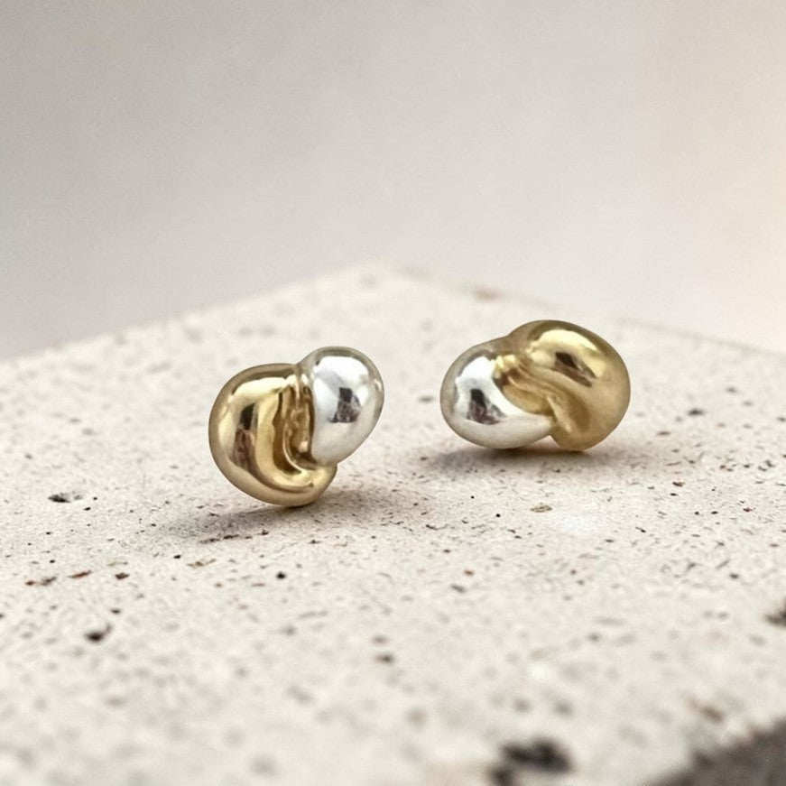 Amara Jewels dual-tone stud earrings in 18K gold-plated sterling silver with organic, fluid shape.