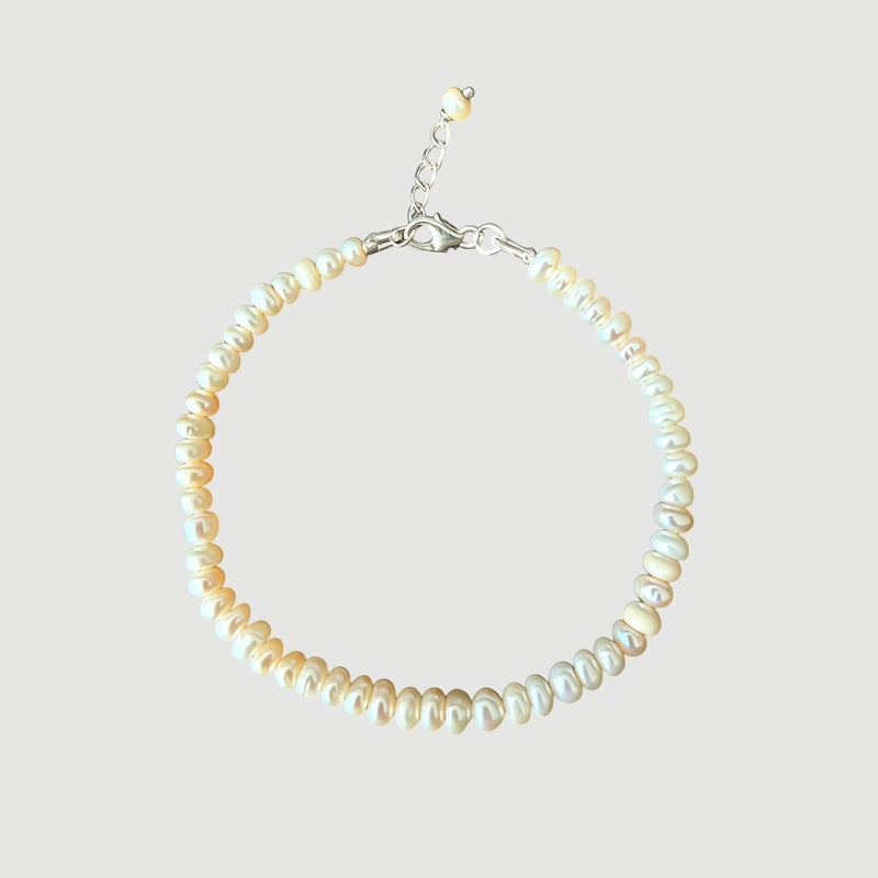 Amara Jewels Freshwater Pearl Bracelet with adjustable silver clasp and extender chain. Features lustrous, organically shaped pearls.