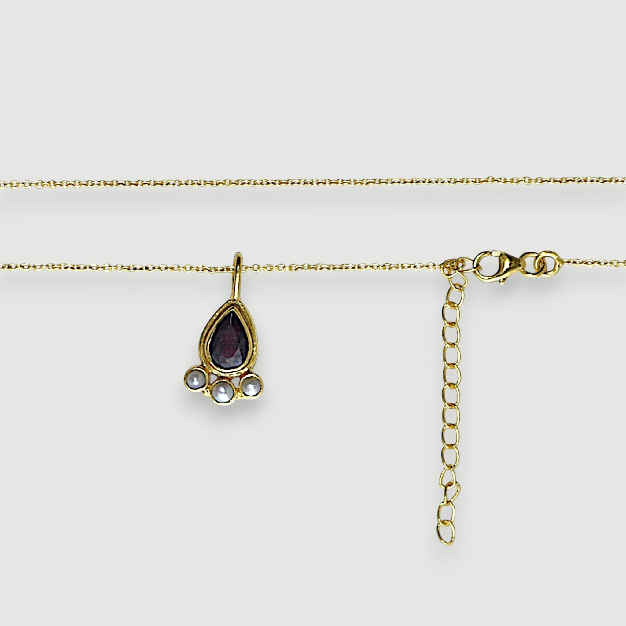 Amara Jewels teardrop necklace with deep red garnet and three pearls, set in 18K gold vermeil over sterling silver.