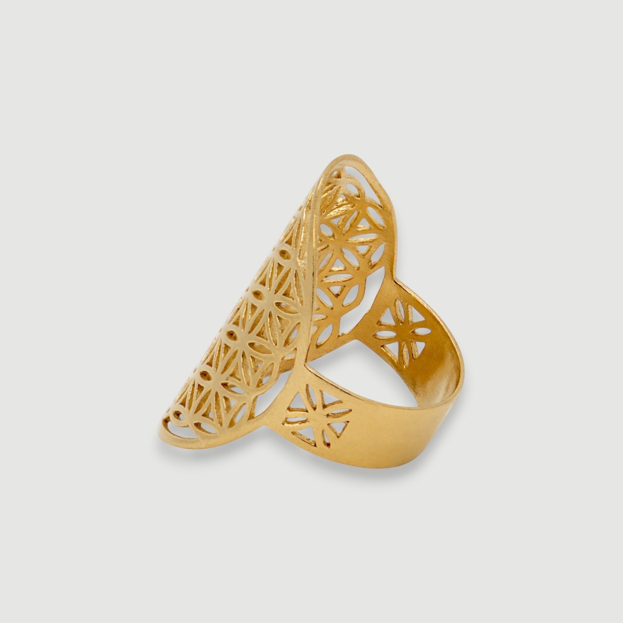 Amara Jewels gold vermeil statement ring with floral cutout pattern and sacred geometry design.
