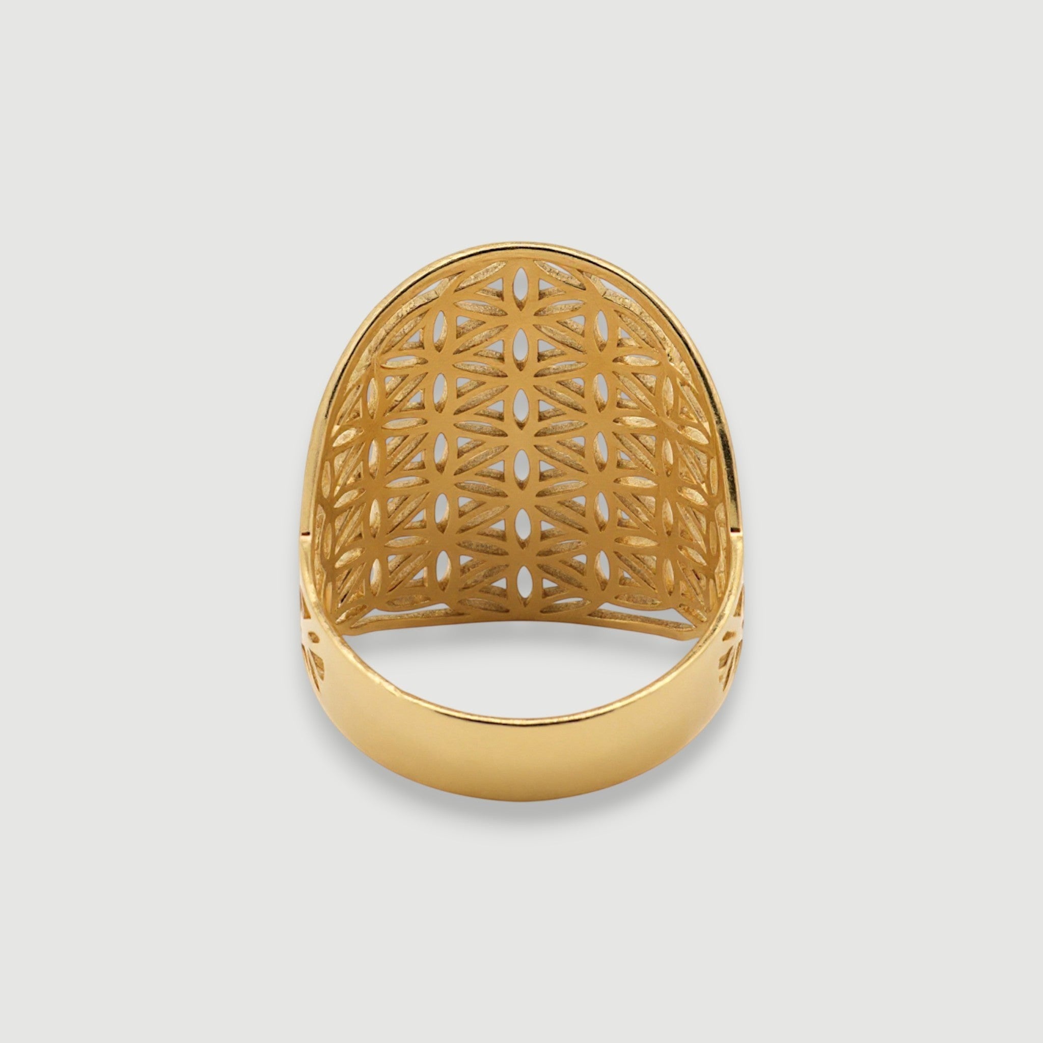 Amara Jewels gold vermeil statement ring with floral cutout pattern and sacred geometry design.