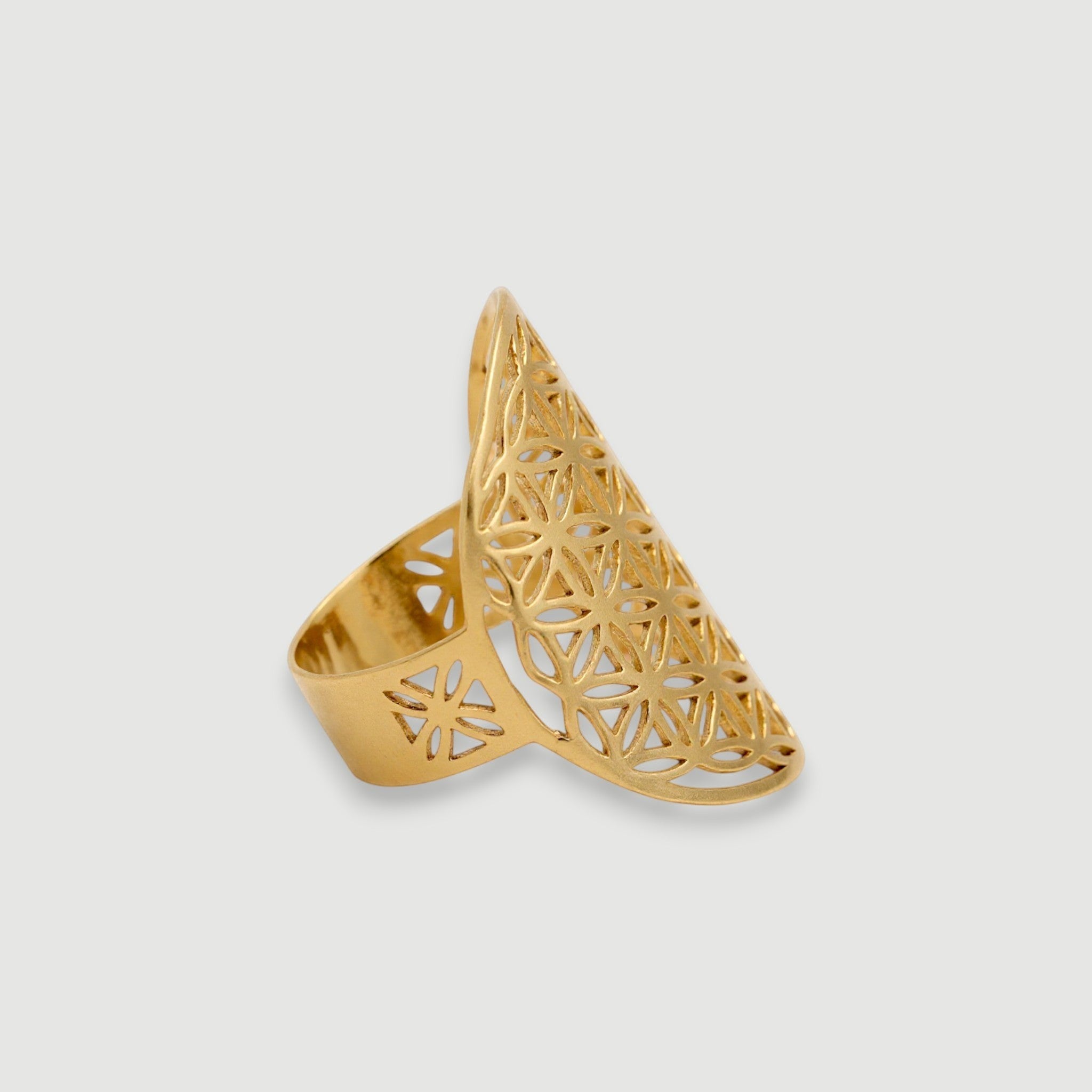 Amara Jewels gold vermeil statement ring with floral cutout pattern and sacred geometry design.