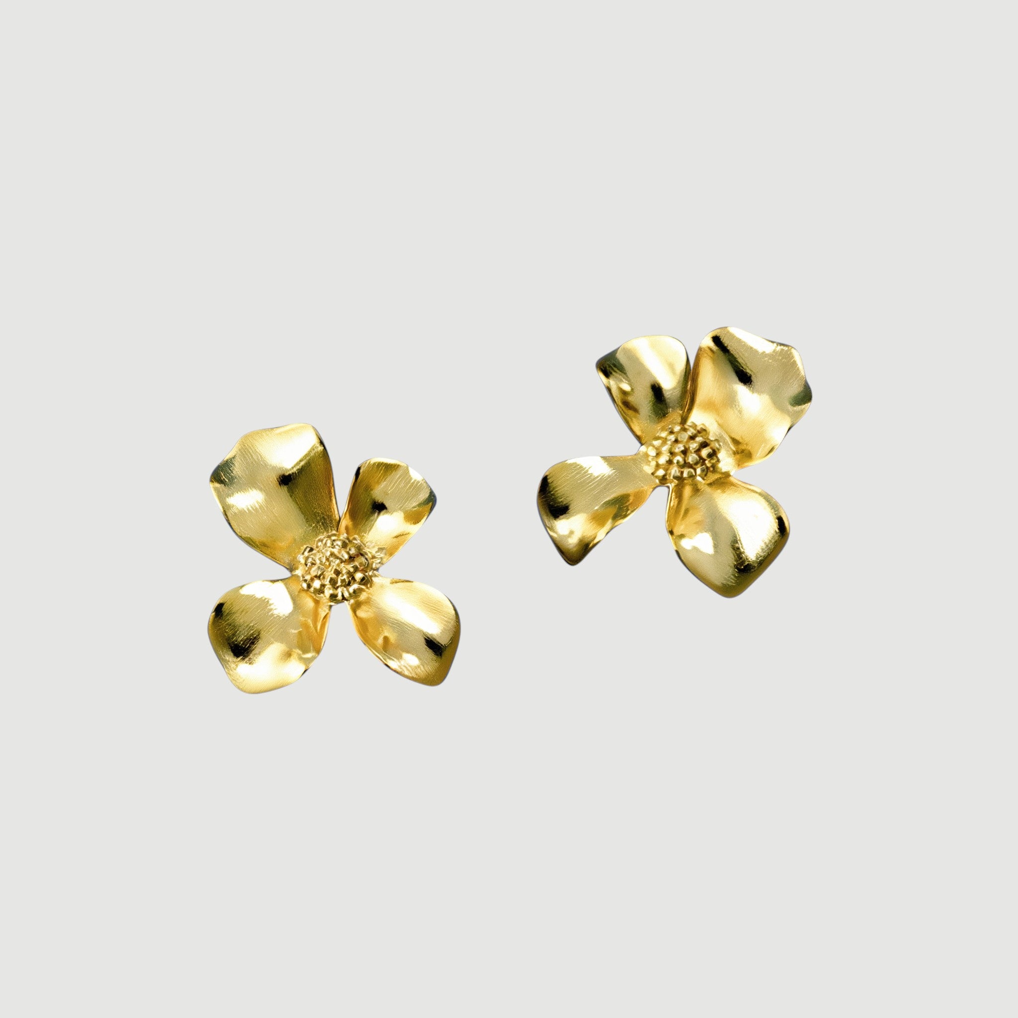 Amara Jewels gold-vermeil sterling silver floral stud earrings with textured petals.