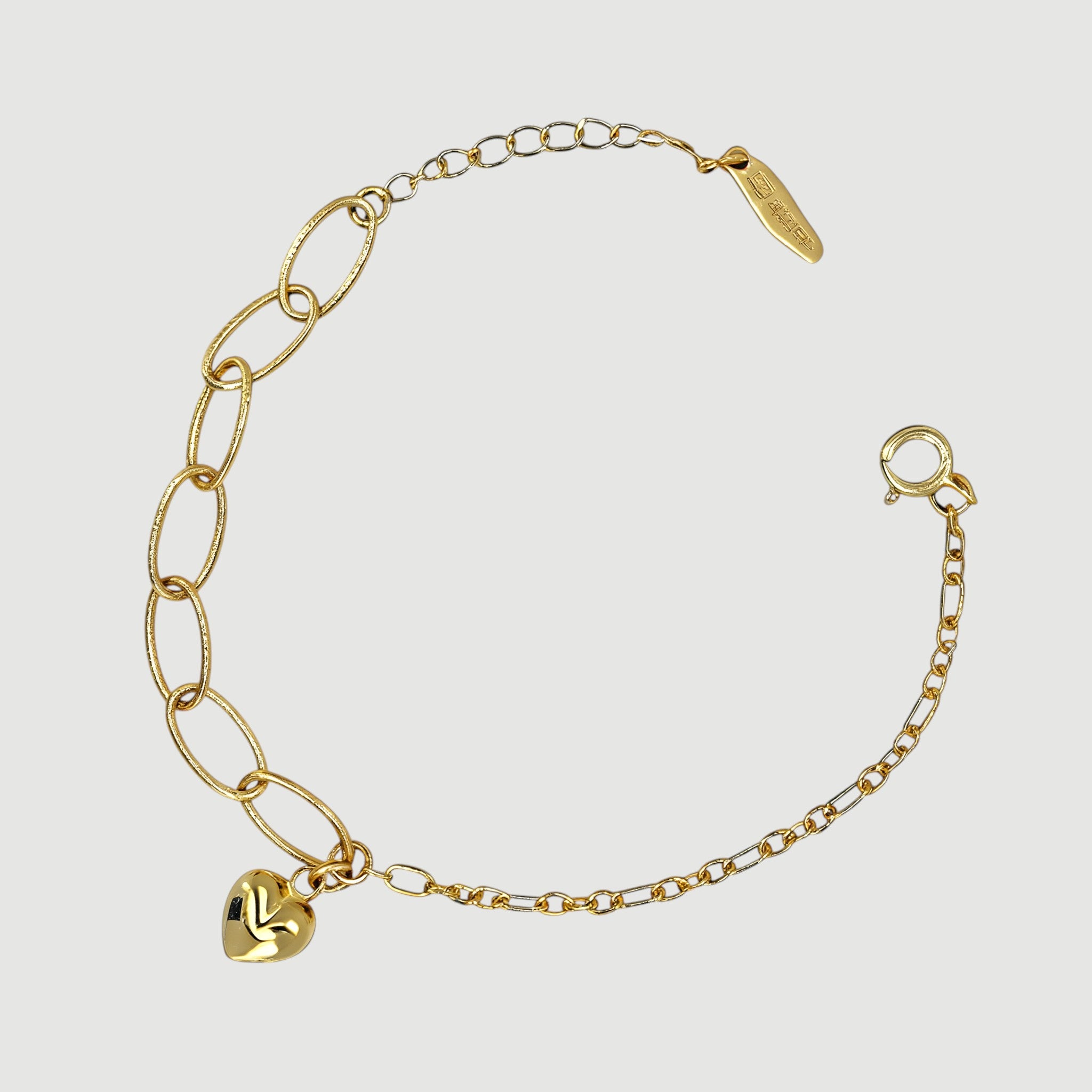 Amara Jewels 18K yellow gold-plated adjustable sterling silver bracelet with elongated links and a polished heart charm.