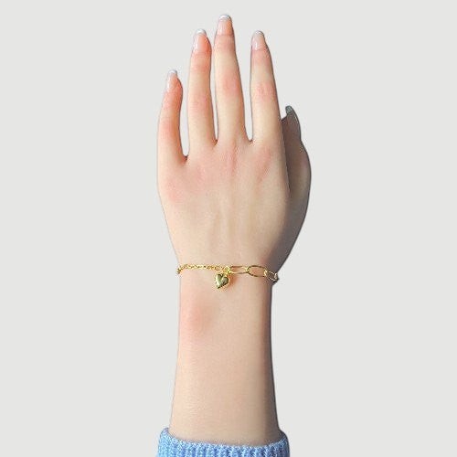 Amara Jewels 18K yellow gold-plated adjustable sterling silver bracelet with elongated links and a polished heart charm.