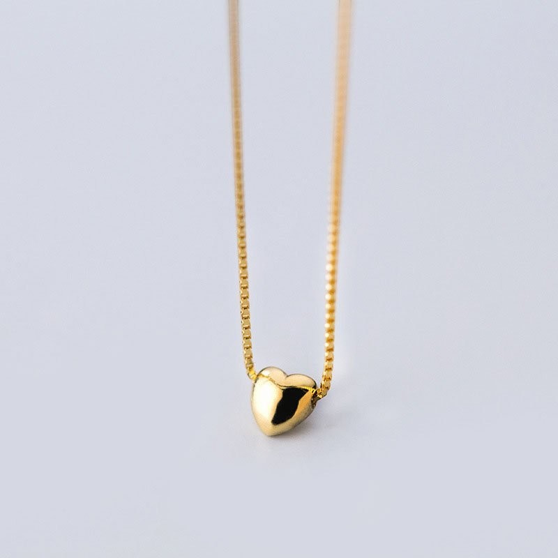 Amara Jewels gold-plated sterling silver minimalist heart necklace on a delicate box chain.