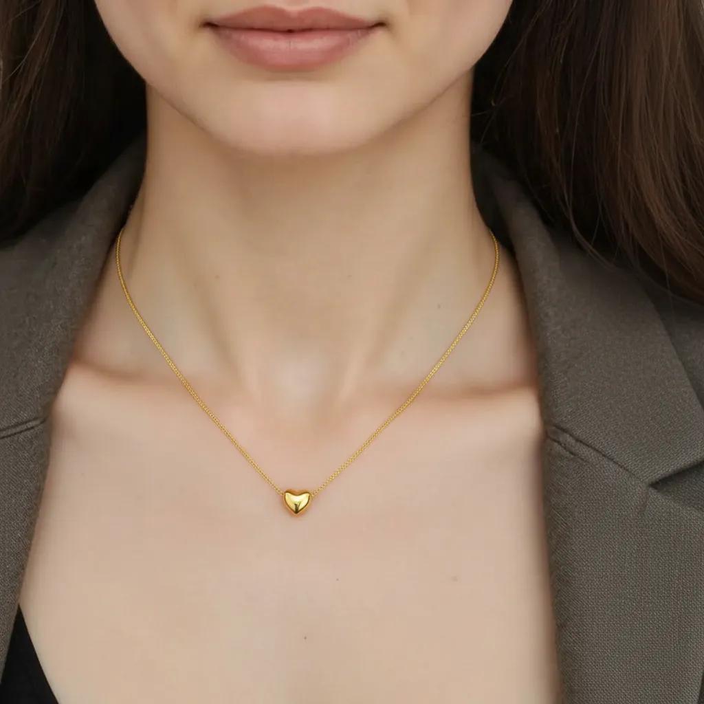 Amara Jewels gold-plated sterling silver minimalist heart necklace on a delicate box chain.