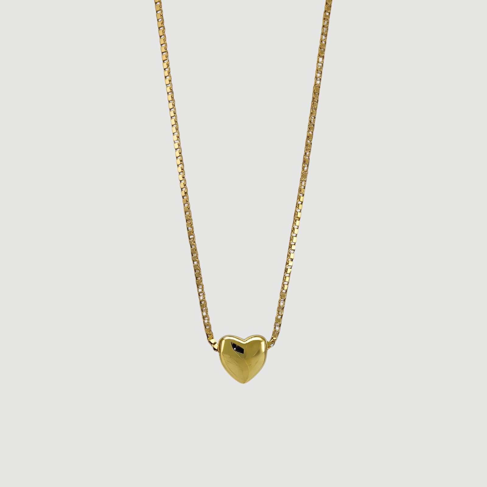 Amara Jewels gold-plated sterling silver minimalist heart necklace on a delicate box chain.