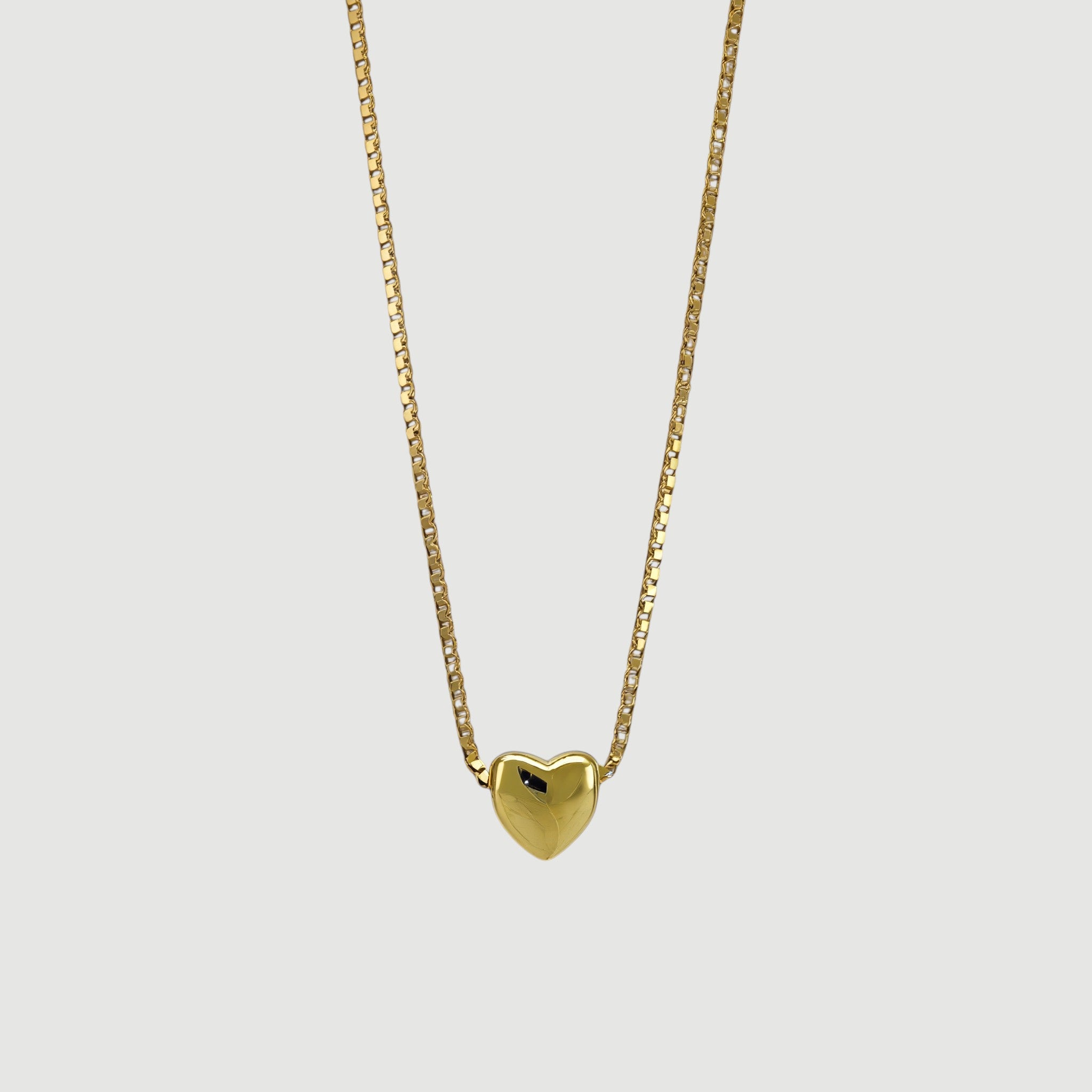 Amara Jewels gold-plated sterling silver minimalist heart necklace on a delicate box chain.