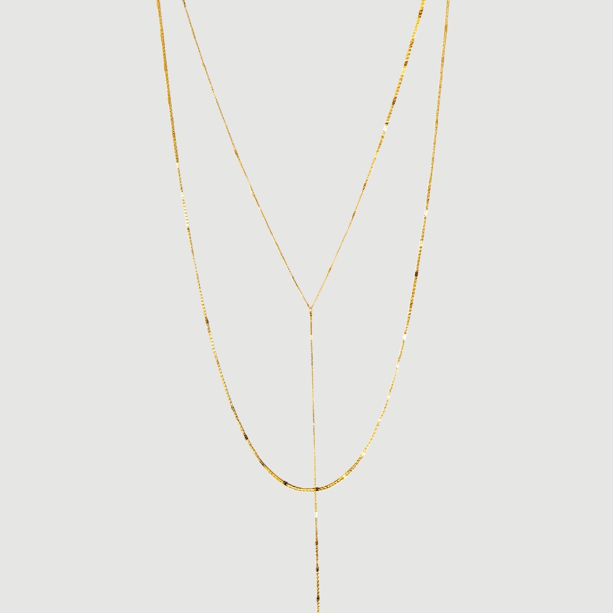 Amara Jewels gold lariat necklace with a Y-shaped chain and subtle bead accents, crafted from 925 sterling silver.