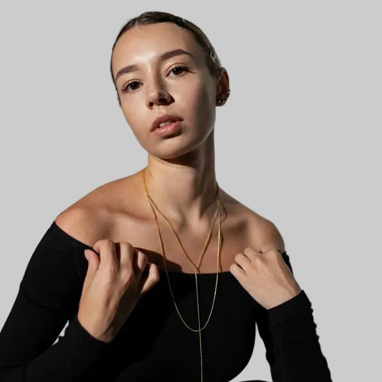 Amara Jewels gold lariat necklace with a Y-shaped chain and subtle bead accents, crafted from 925 sterling silver.