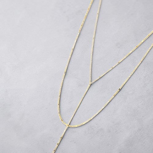 Amara Jewels gold lariat necklace with a Y-shaped chain and subtle bead accents, crafted from 925 sterling silver.