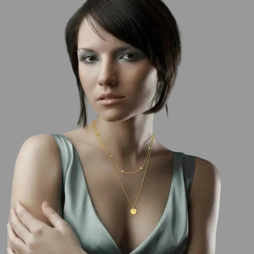 Amara Jewels gold-plated sterling silver layered necklace with bead chain and disc charm.