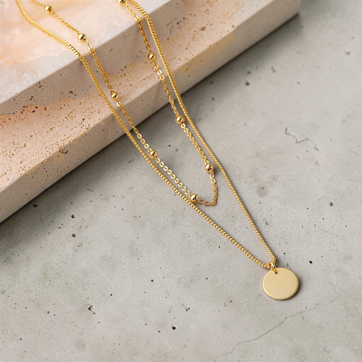 Amara Jewels gold-plated sterling silver layered necklace with bead chain and disc charm.