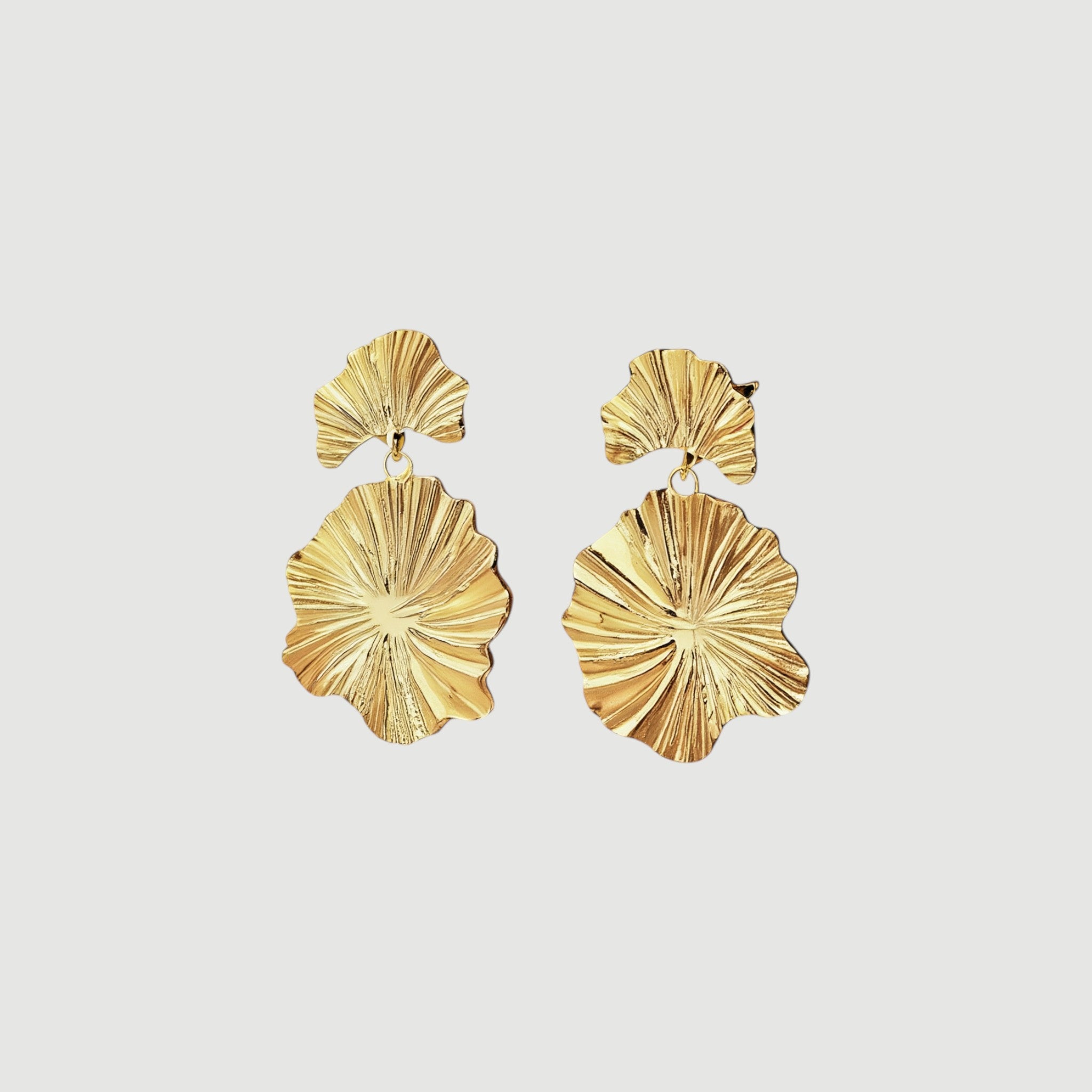 Amara Jewels gold-plated sterling silver leaf drop earrings with layered, textured design.