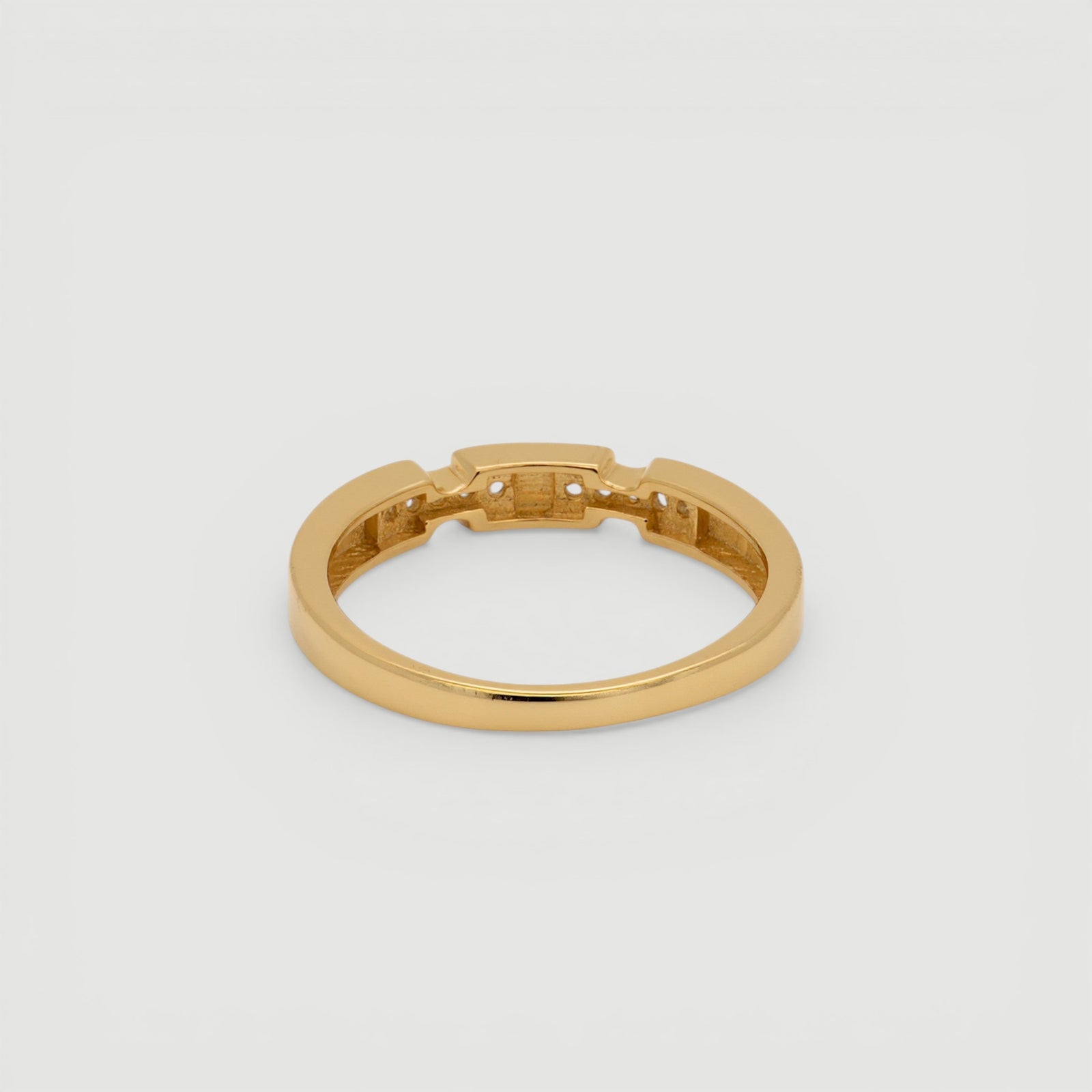 Amara Jewels minimalist gold stacking ring with white zircon stones, crafted from 18K gold plated sterling silver.