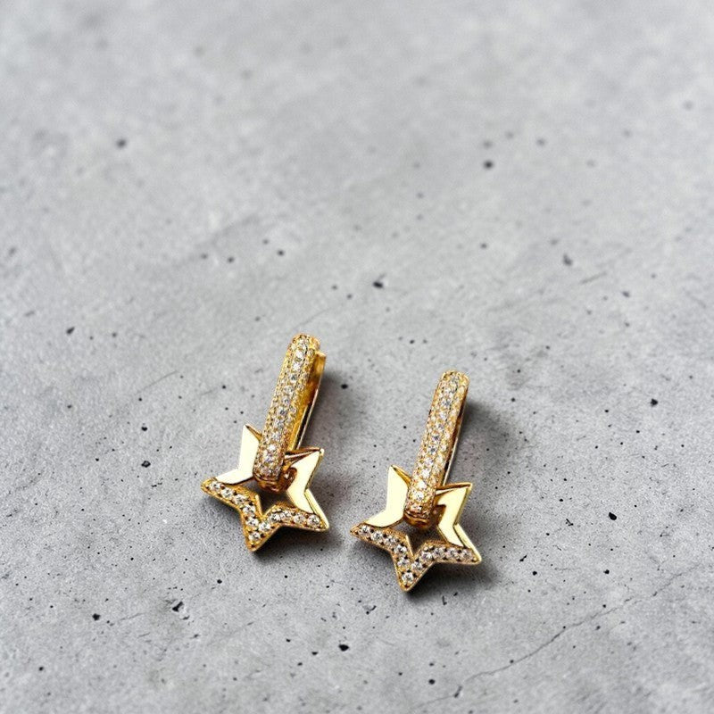 Amara Jewels gold-plated sterling silver hoop earrings with star motif adorned with cubic zirconia stones.
