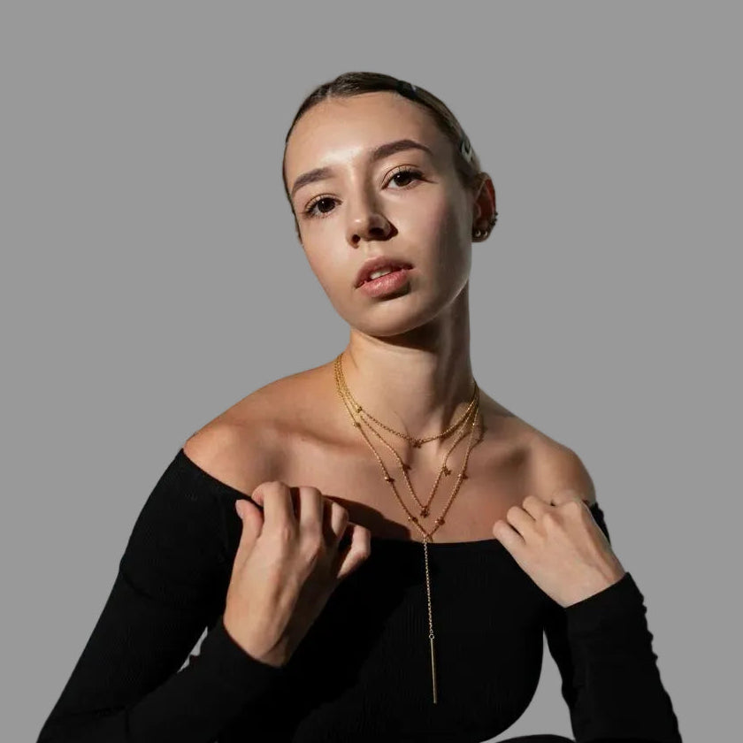 Amara Jewels rose gold plated sterling silver necklace with a star pendant and cubic zirconia accents.