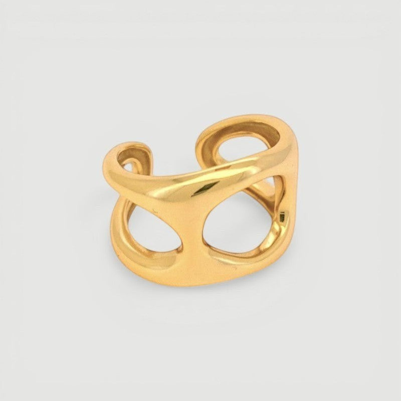 Amara Jewels gold open-cut statement ring with modern, abstract design. Made of 925 sterling silver with a gold finish.