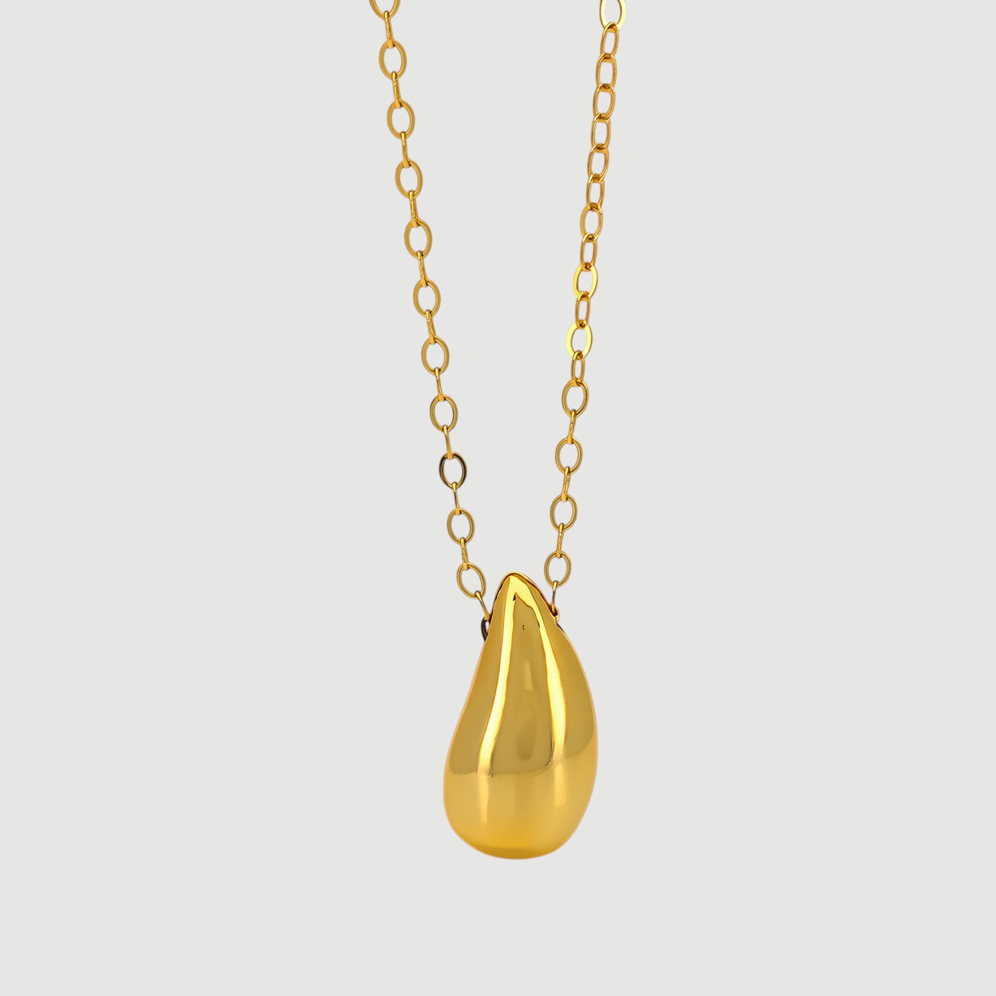 Amara Jewels gold tone teardrop pendant necklace on a dainty chain, made of 925 sterling silver.