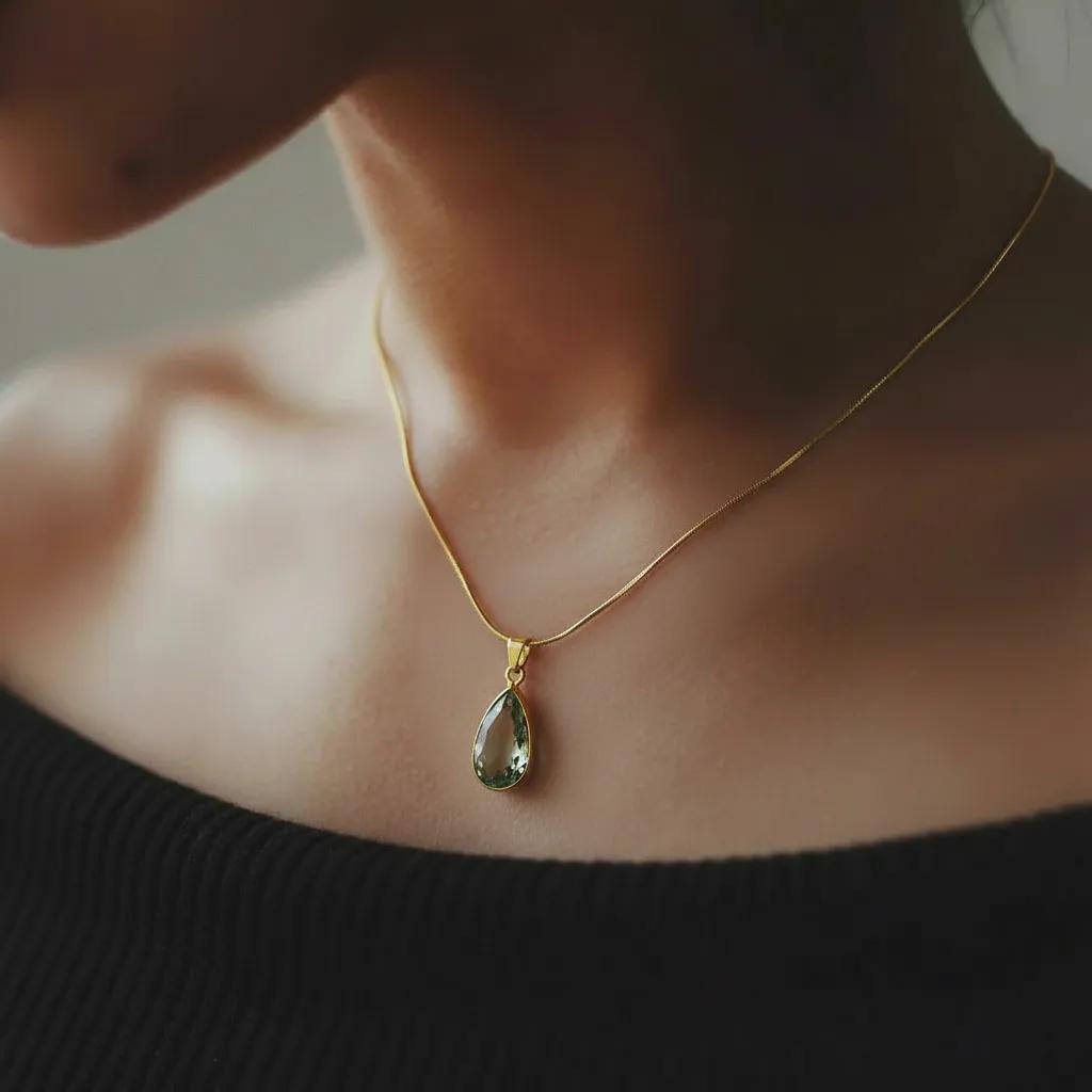 Amara Jewels sterling silver green amethyst teardrop pendant necklace on a snake chain and 18k gold vermeil.