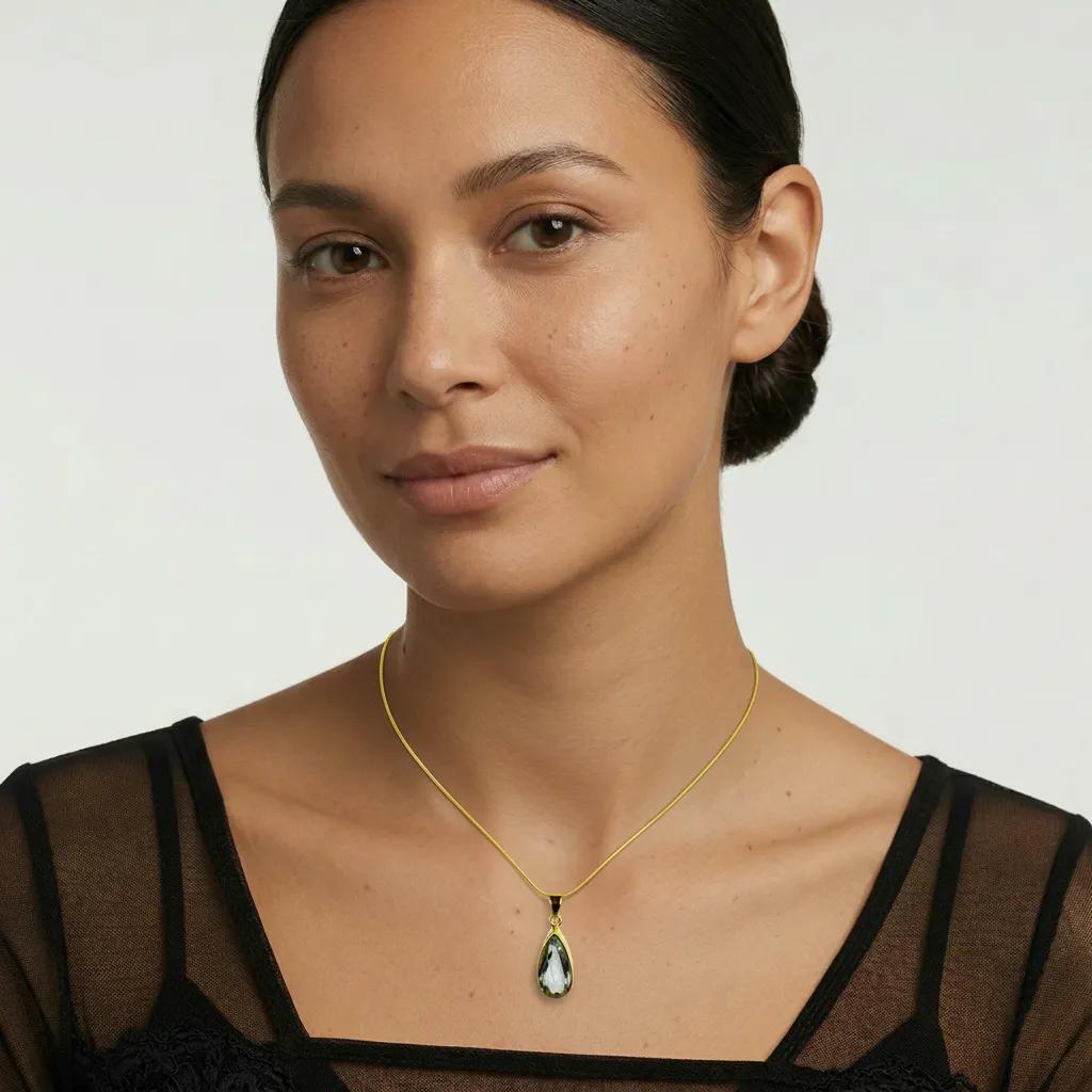 Amara Jewels sterling silver green amethyst teardrop pendant necklace on a snake chain and 18k gold vermeil.