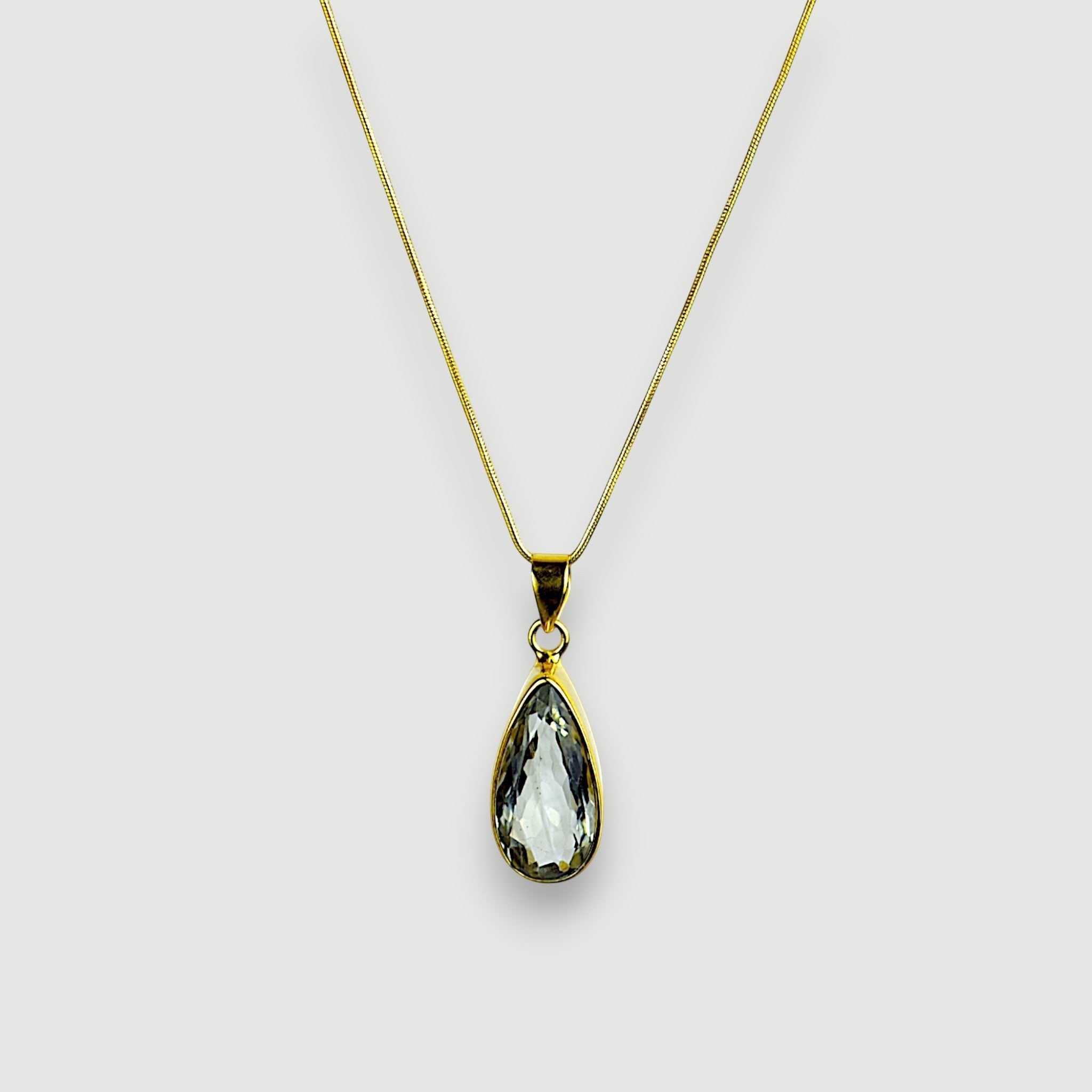 Amara Jewels sterling silver green amethyst teardrop pendant necklace on a snake chain and 18k gold vermeil.