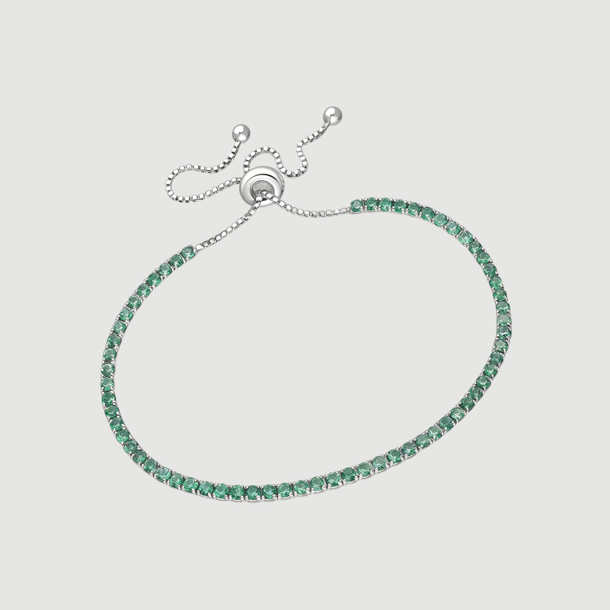 Amara Jewels sterling silver adjustable tennis bracelet with forest green gemstones and a slider clasp.