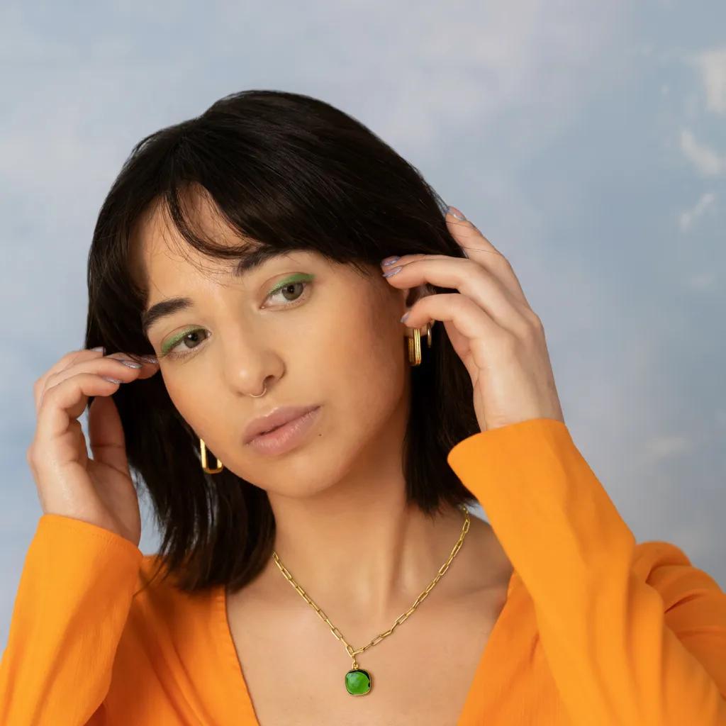 Amara Jewels green faceted cushion-cut green onyx gemstone pendant necklace on a gold paperclip chain.