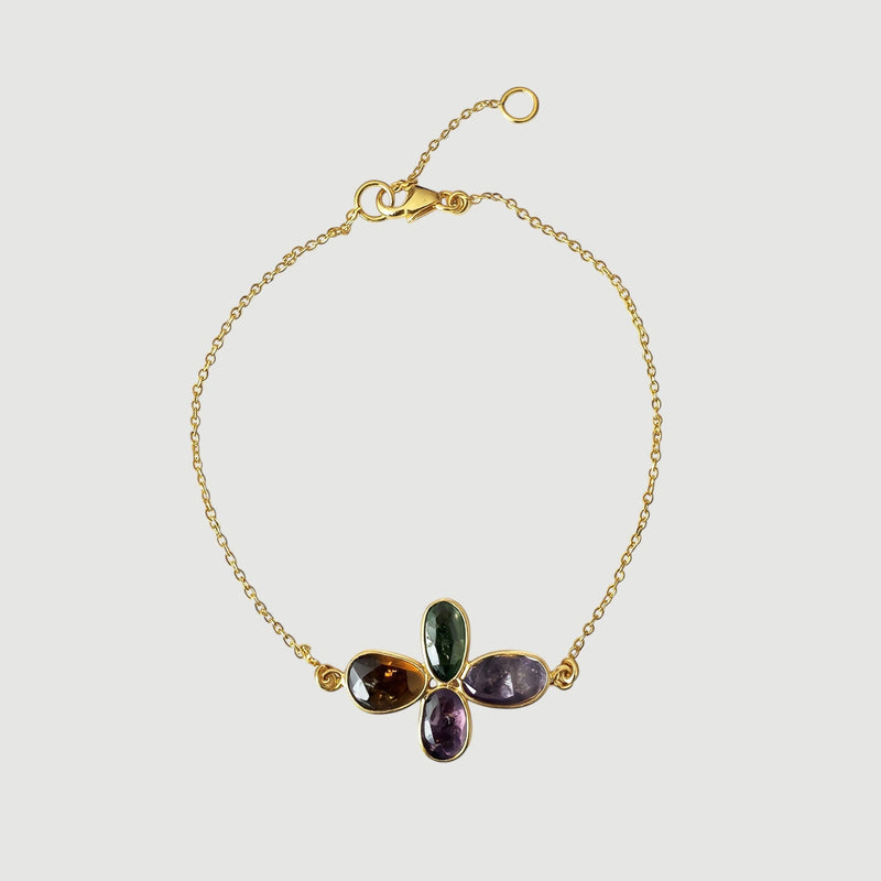 Amara Jewels Harmony Gemstone Bracelet in gold vermeil sterling silver with multi-colored natural gemstones arranged in a floral pattern.