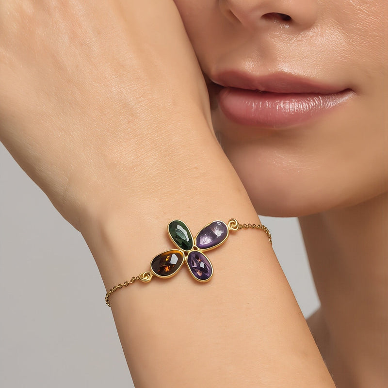 Amara Jewels Harmony Gemstone Bracelet in gold vermeil sterling silver with multi-colored natural gemstones arranged in a floral pattern.