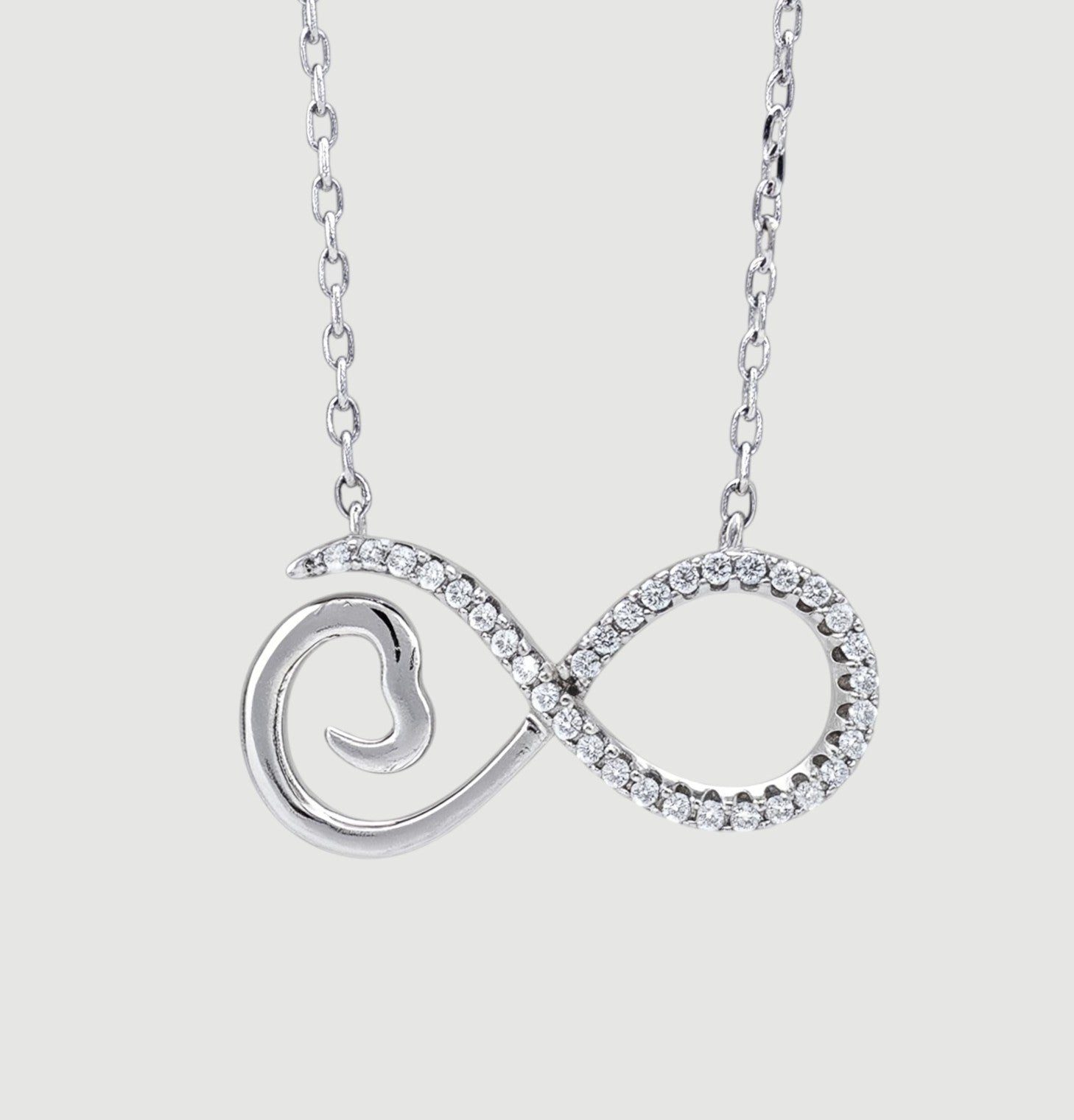 Amara Jewels sterling silver infinity heart necklace with cubic zirconia accents and a delicate chain.