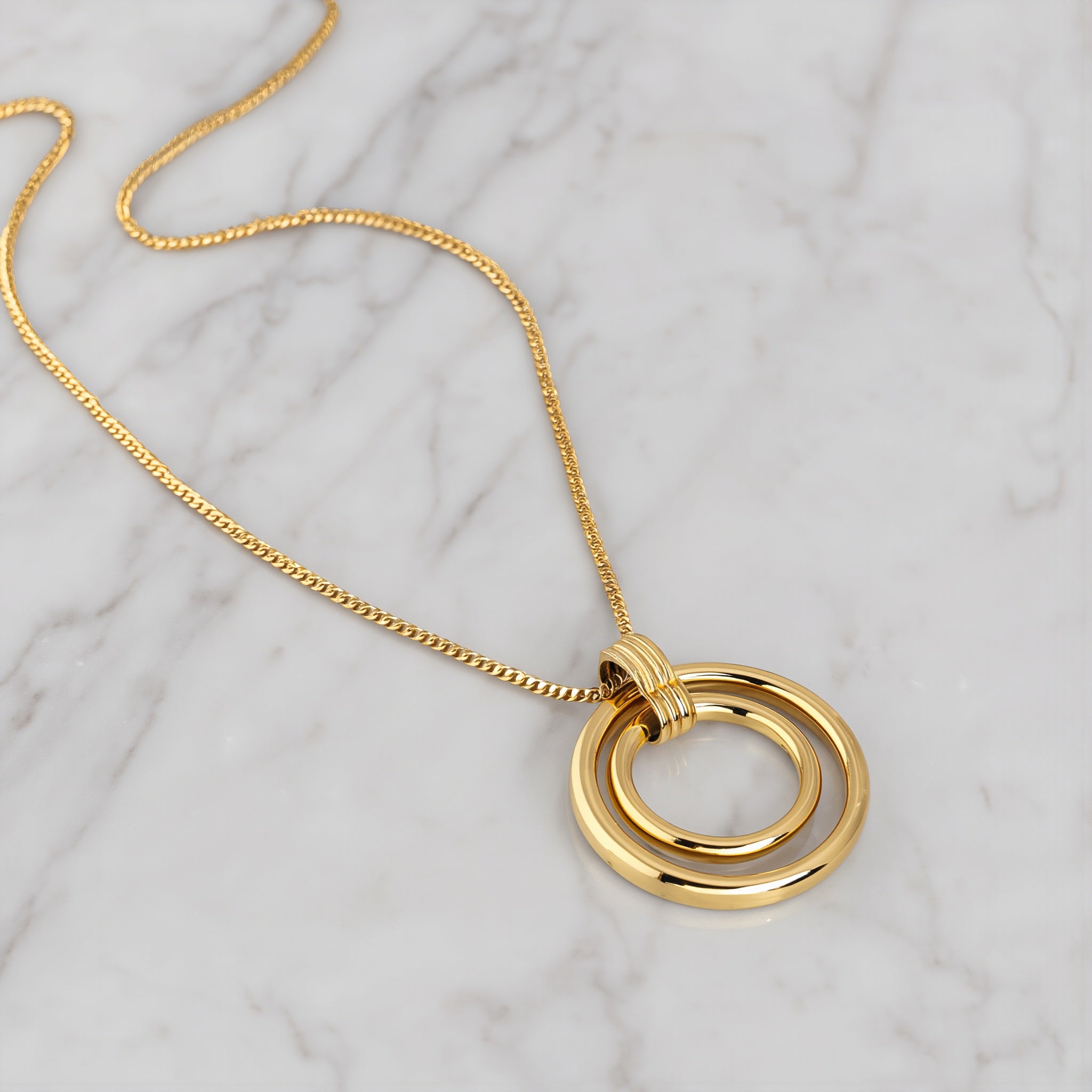 Amara Jewels 18K yellow gold plated sterling silver interlocking circle pendant necklace.