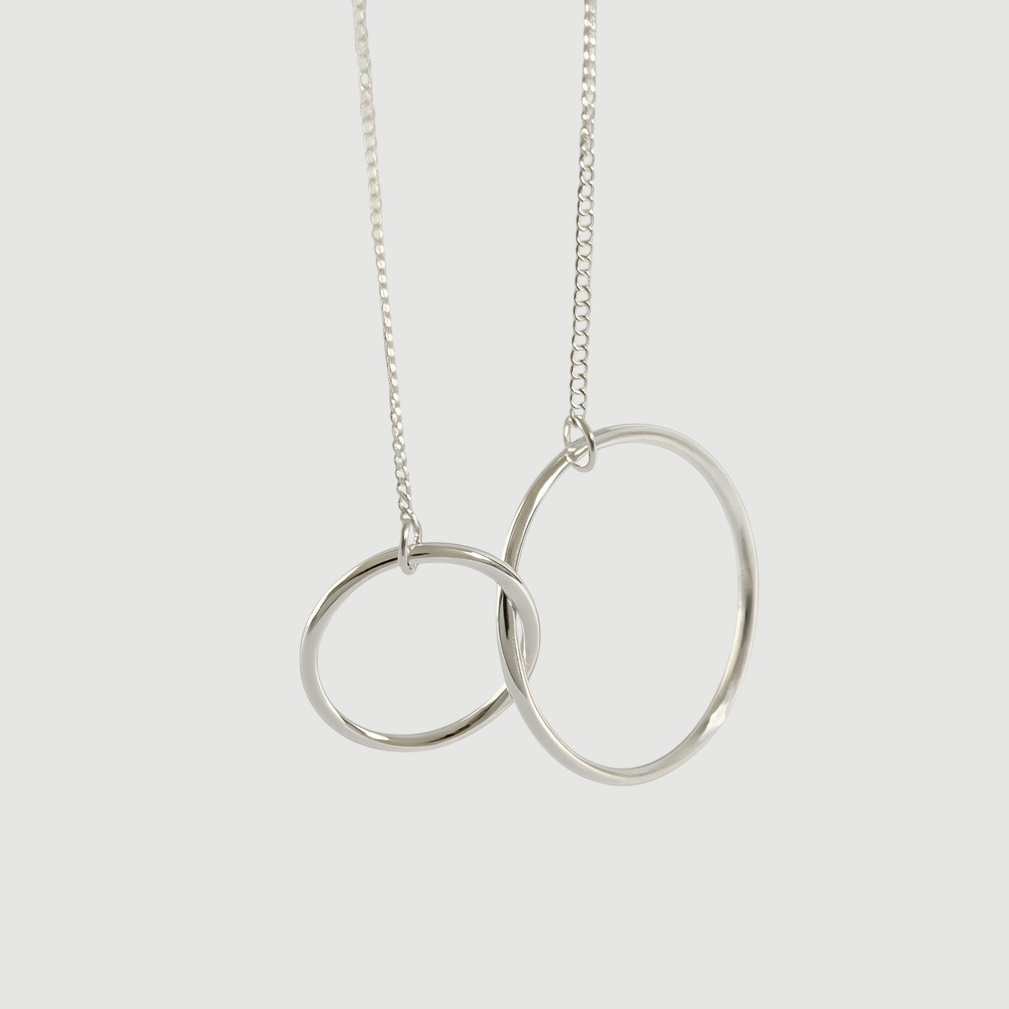 Amara Jewels elegant interlocking circles necklace in polished sterling silver.