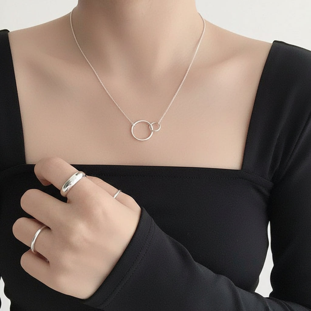 Amara Jewels elegant interlocking circles necklace in polished sterling silver.