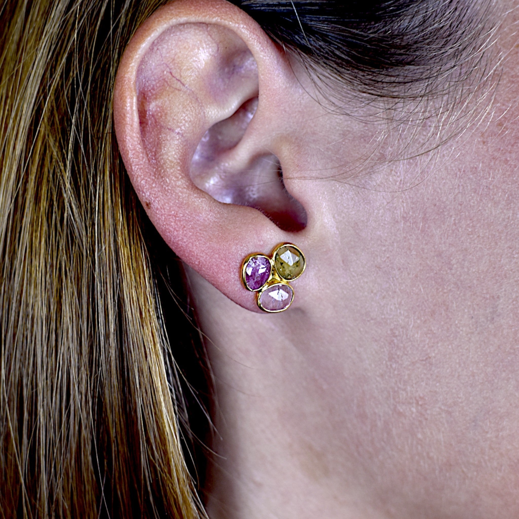 Amara Jewels natural multi-color tourmaline stud earrings in 18K gold vermeil over sterling silver. Features pink, green, and brown hues.